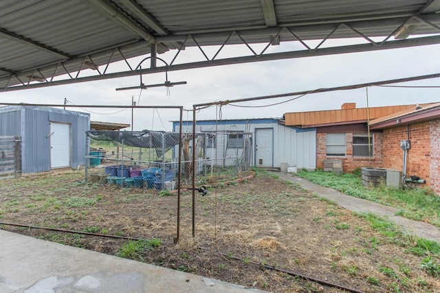 view of yard with a shed