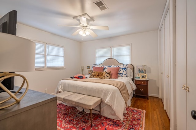 2209 Shell Ave, Midland, TX 79705 - bedroom featuring wood finished floors and a ceiling fan