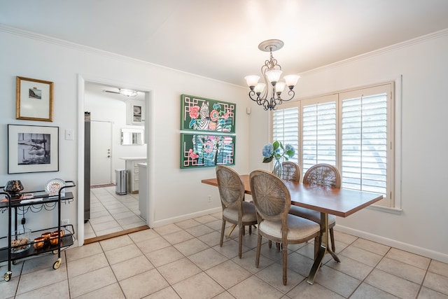2209 Shell Ave, Midland, TX 79705 - dining space with ornamental molding, a chandelier, baseboards, and light tile patterned flooring
