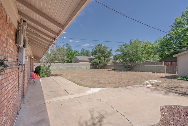 2209 Shell Ave, Midland, TX 79705 - fenced backyard with a patio