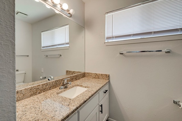 4003 Angelina Dr, Midland, TX 79705 - half bath with vanity and toilet