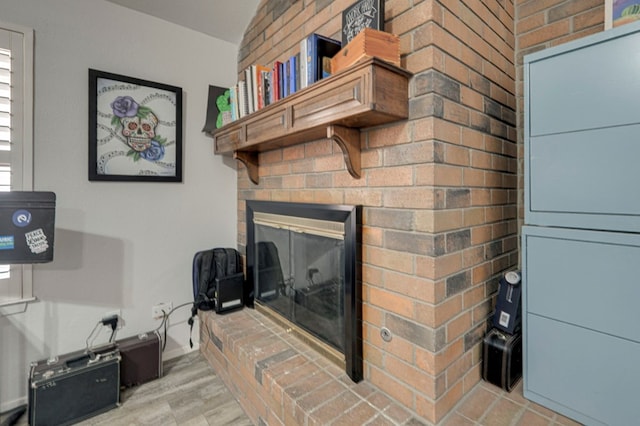 4003 Angelina Dr, Midland, TX 79705 - detailed view of a brick fireplace and wood finished floors
