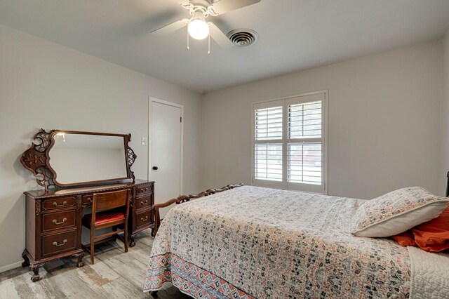 4003 Angelina Dr, Midland, TX 79705 - bedroom featuring light wood-type flooring, a ceiling fan, and baseboards