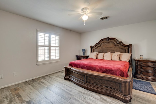 4003 Angelina Dr, Midland, TX 79705 - bedroom with wood finished floors, baseboards, and ceiling fan