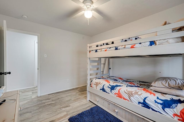 4003 Angelina Dr, Midland, TX 79705 - bedroom with light wood-style floors, baseboards, and a ceiling fan