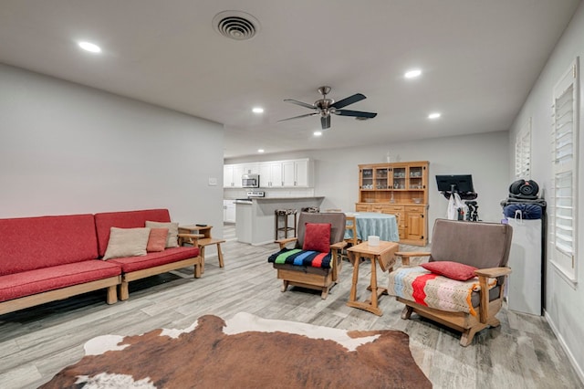 4003 Angelina Dr, Midland, TX 79705 - living room with light wood-type flooring, recessed lighting, ceiling fan, and baseboards
