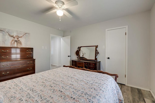 4003 Angelina Dr, Midland, TX 79705 - bedroom featuring wood finished floors, ceiling fan, and baseboards