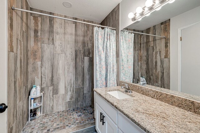 4003 Angelina Dr, Midland, TX 79705 - full bath featuring vanity and tiled shower