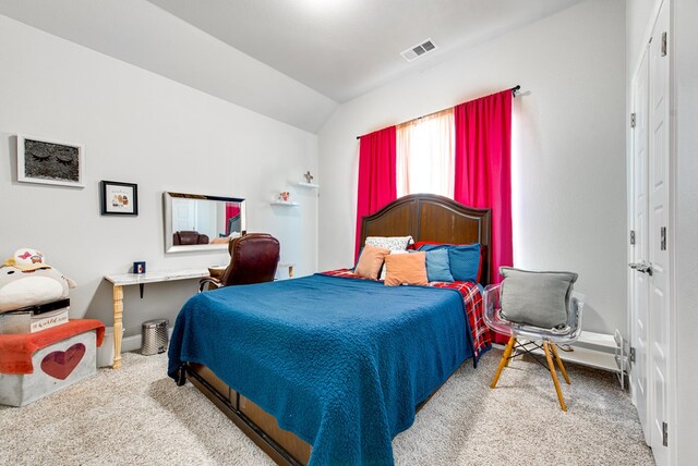 13 La Cresta Ave, Odessa, TX 79765 - carpeted bedroom with lofted ceiling and baseboards