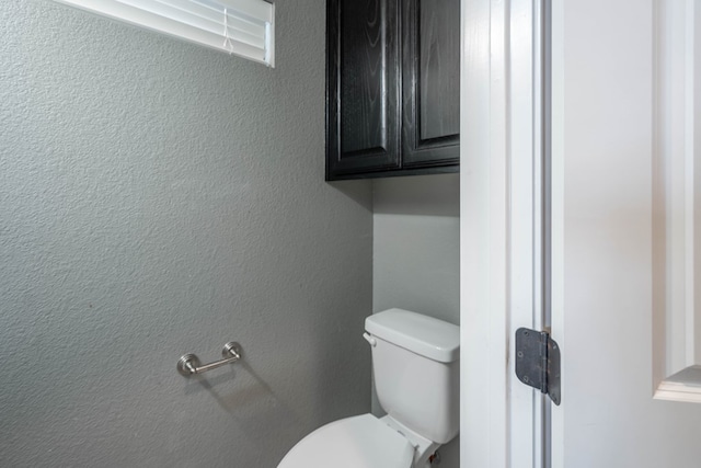 bathroom featuring toilet