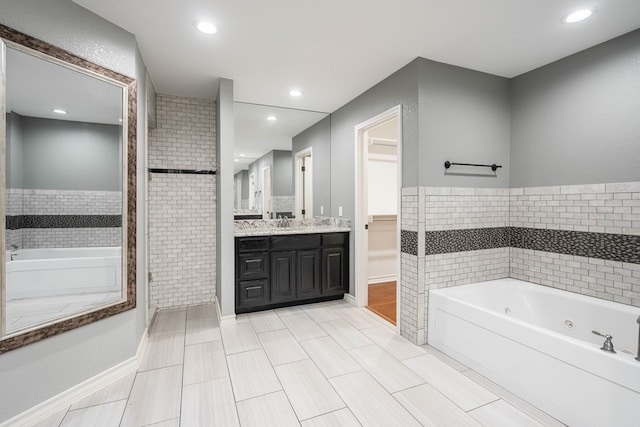 bathroom featuring a bathtub and vanity