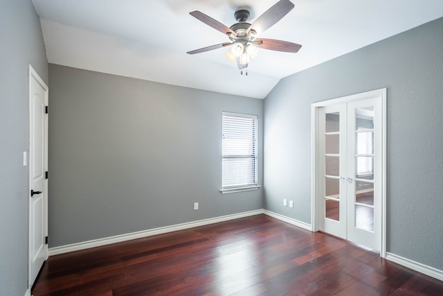 unfurnished room featuring french doors, wood finished floors, lofted ceiling, a ceiling fan, and baseboards