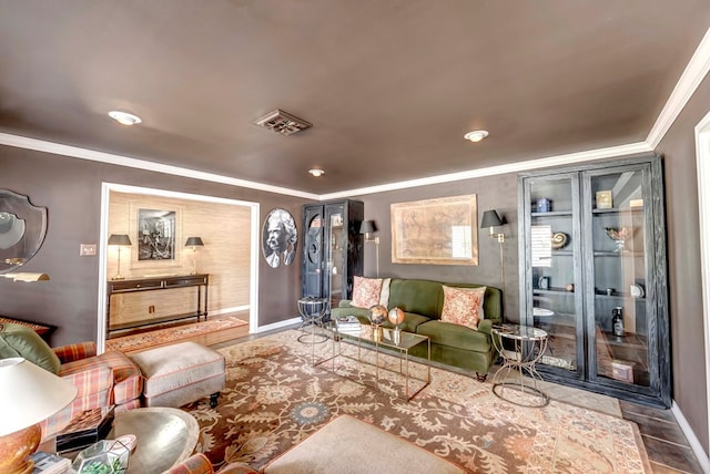 living room with ornamental molding