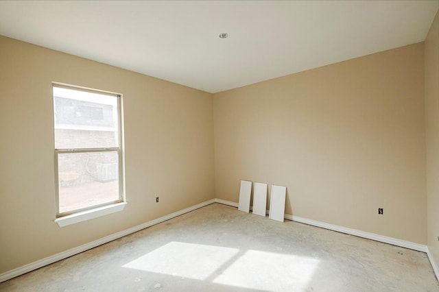 2201 S County Rd 1059, Midland, TX 79706 - unfurnished room featuring baseboards and a healthy amount of sunlight