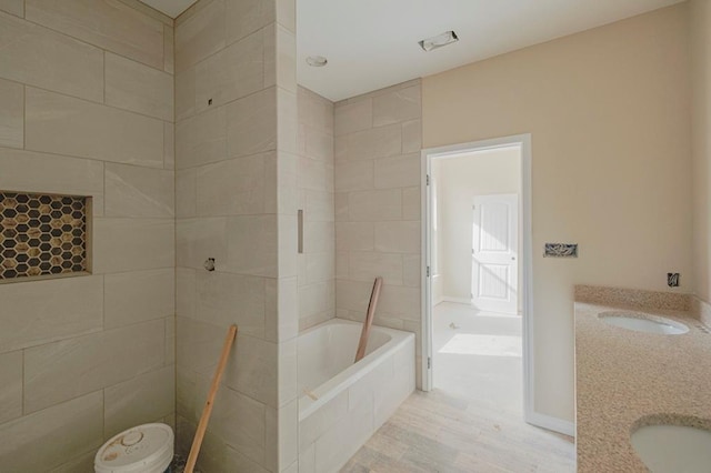 2201 S County Rd 1059, Midland, TX 79706 - full bathroom with a bath, double vanity, and a sink