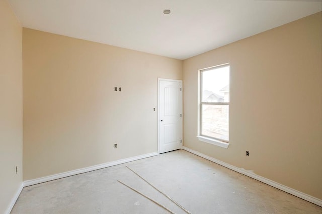 2201 S County Rd 1059, Midland, TX 79706 - empty room featuring baseboards and concrete floors