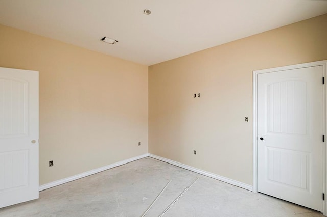 2201 S County Rd 1059, Midland, TX 79706 - spare room with baseboards and concrete flooring