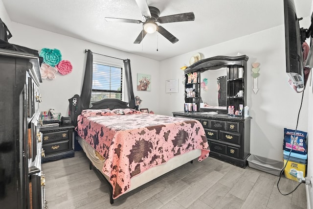 400 Player Ct, Midland, TX 79705 - bedroom featuring light wood-type flooring and ceiling fan