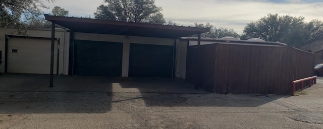 exterior space featuring a carport