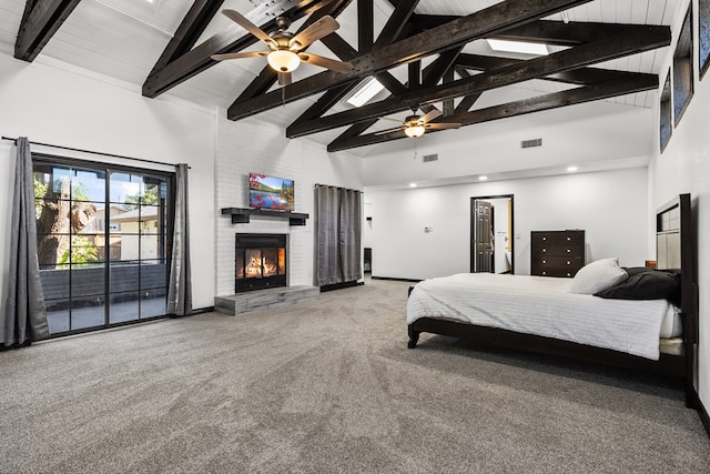 carpeted bedroom featuring beamed ceiling, high vaulted ceiling, and ceiling fan