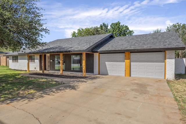 single story home featuring a garage