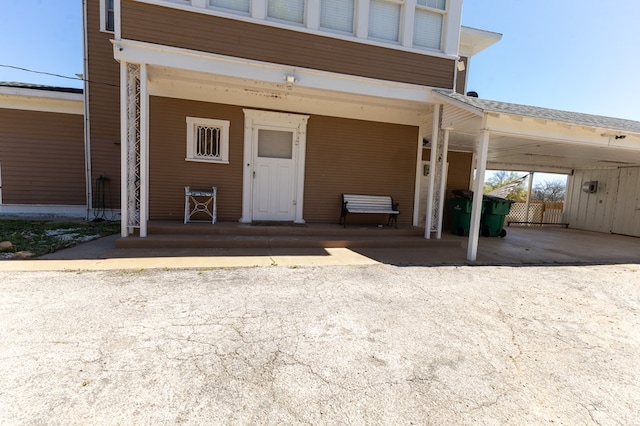 exterior space featuring a carport