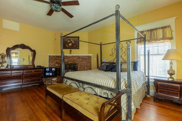 bedroom with hardwood / wood-style floors and ceiling fan