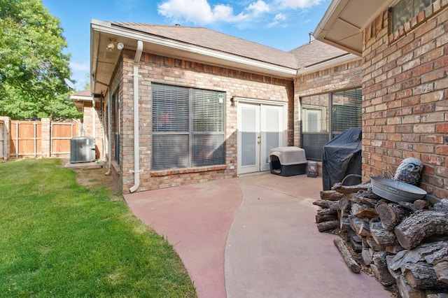 view of patio / terrace featuring central air condition unit and french doors