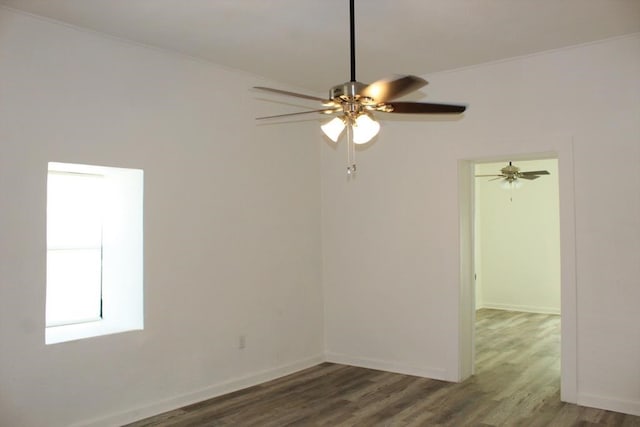 spare room with dark wood-type flooring