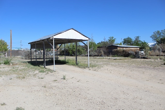 view of yard featuring a carport