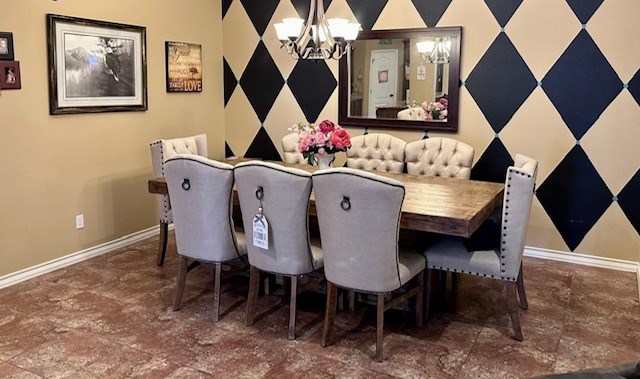 3113 San Pedro Dr, Odessa, TX 79765 - dining room featuring baseboards and a chandelier