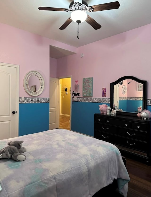 3113 San Pedro Dr, Odessa, TX 79765 - bedroom with dark wood finished floors and ceiling fan