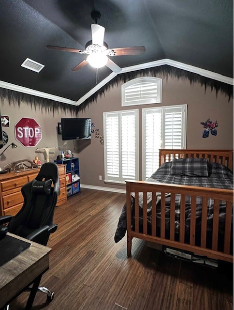 3113 San Pedro Dr, Odessa, TX 79765 - bedroom featuring lofted ceiling, wood finished floors, a desk, ceiling fan, and baseboards