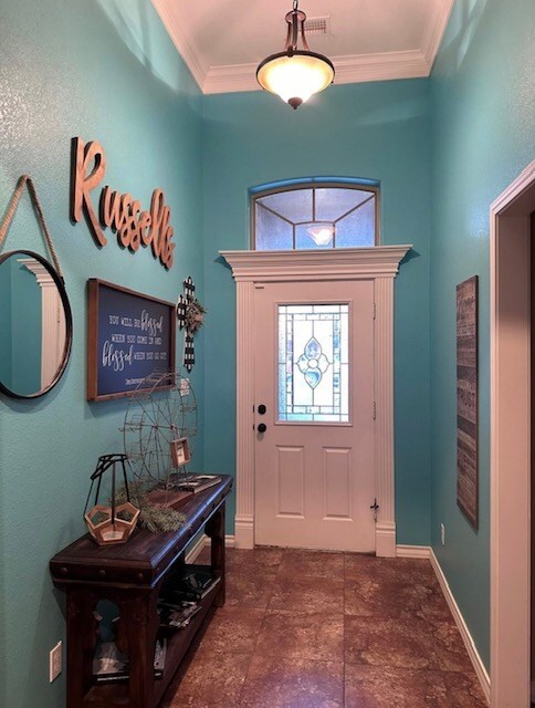 3113 San Pedro Dr, Odessa, TX 79765 - foyer entrance featuring baseboards and ornamental molding