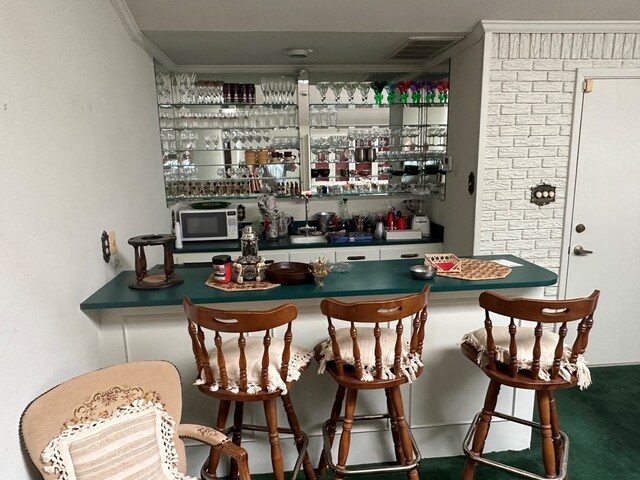 bar featuring ornamental molding