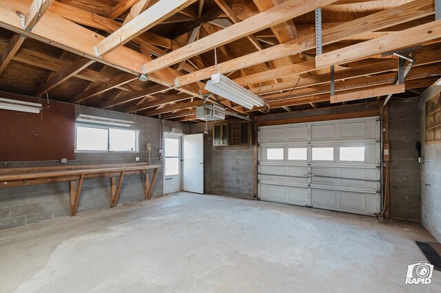 404 E Dormard Ave, Midland, TX 79705 - garage featuring concrete block wall