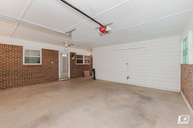 404 E Dormard Ave, Midland, TX 79705 - garage featuring a ceiling fan and a garage door opener