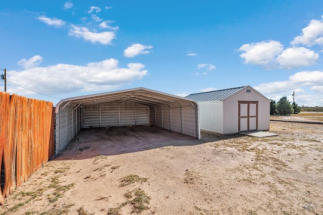 view of outbuilding with a carport