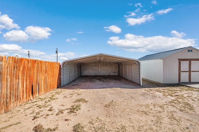 view of outbuilding featuring a carport