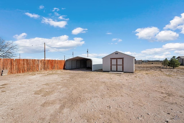 view of outbuilding featuring a carport