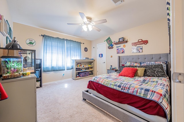 bedroom featuring carpet floors, baseboards, and a ceiling fan