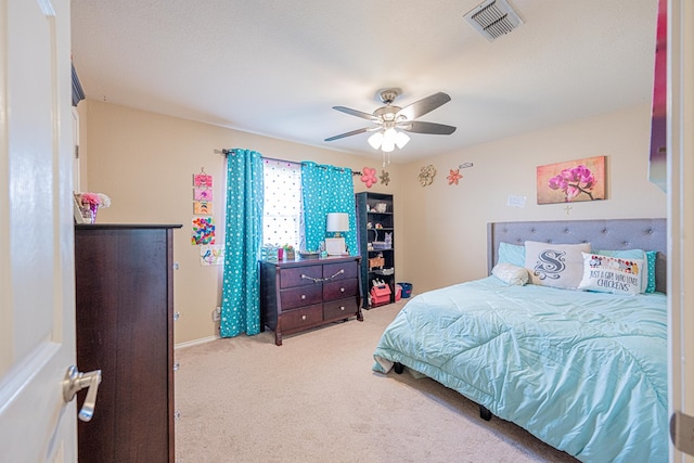 bedroom featuring carpet floors, ceiling fan, and baseboards