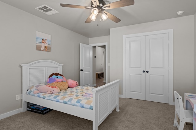 2602 Ivy Ln, Midland, TX 79705 - bedroom with carpet floors, ceiling fan, and a closet