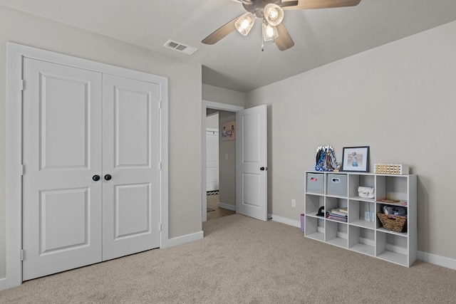 2602 Ivy Ln, Midland, TX 79705 - bedroom with carpet floors, a closet, and ceiling fan