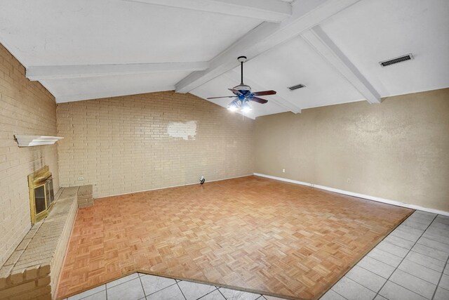4205 Irvin Dr, Midland, TX 79705 - unfurnished living room featuring brick wall, a ceiling fan, a fireplace, and baseboards