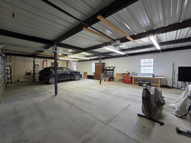 1200 W Cuthbert Ave, Midland, TX 79701 - garage featuring a garage door opener