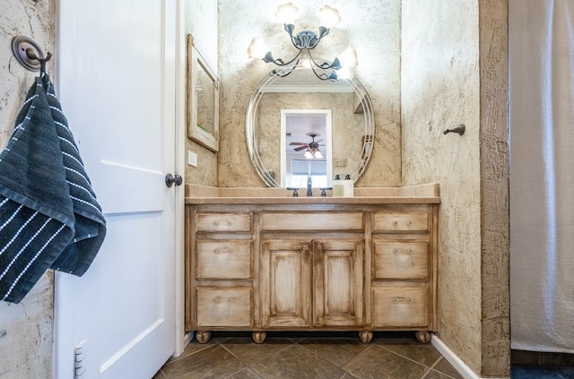 bathroom featuring vanity, a ceiling fan, and tile patterned floors