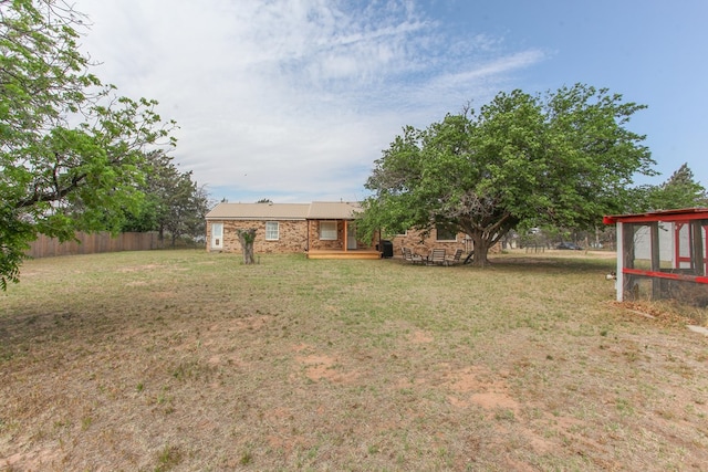 view of yard featuring fence