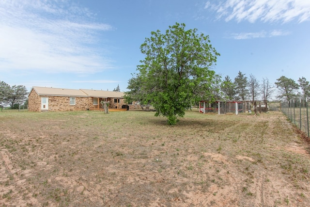 view of yard featuring exterior structure