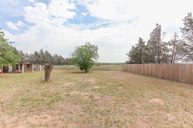 view of yard with fence